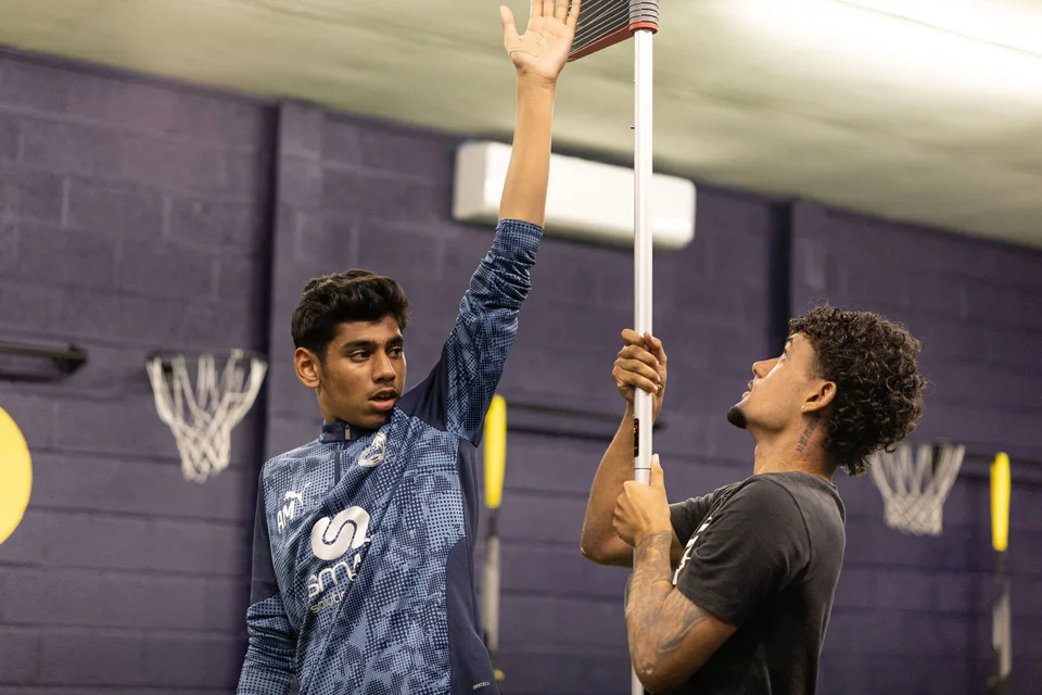 Playermade coach assessing an athlete’s physical performance