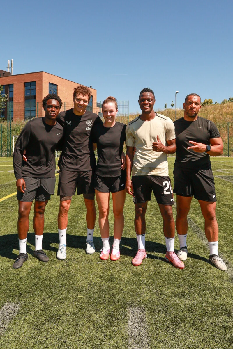 Footballers and coaches together at a Playermade pitch session